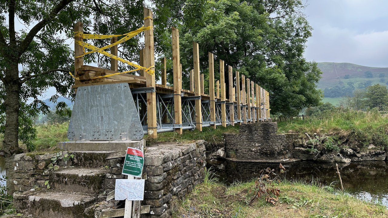  A new and improved bridge in the works. People are so polite, the person from the Park working on it apologized for the inconvenience. Thank YOU for making things better, Bridge Man. 