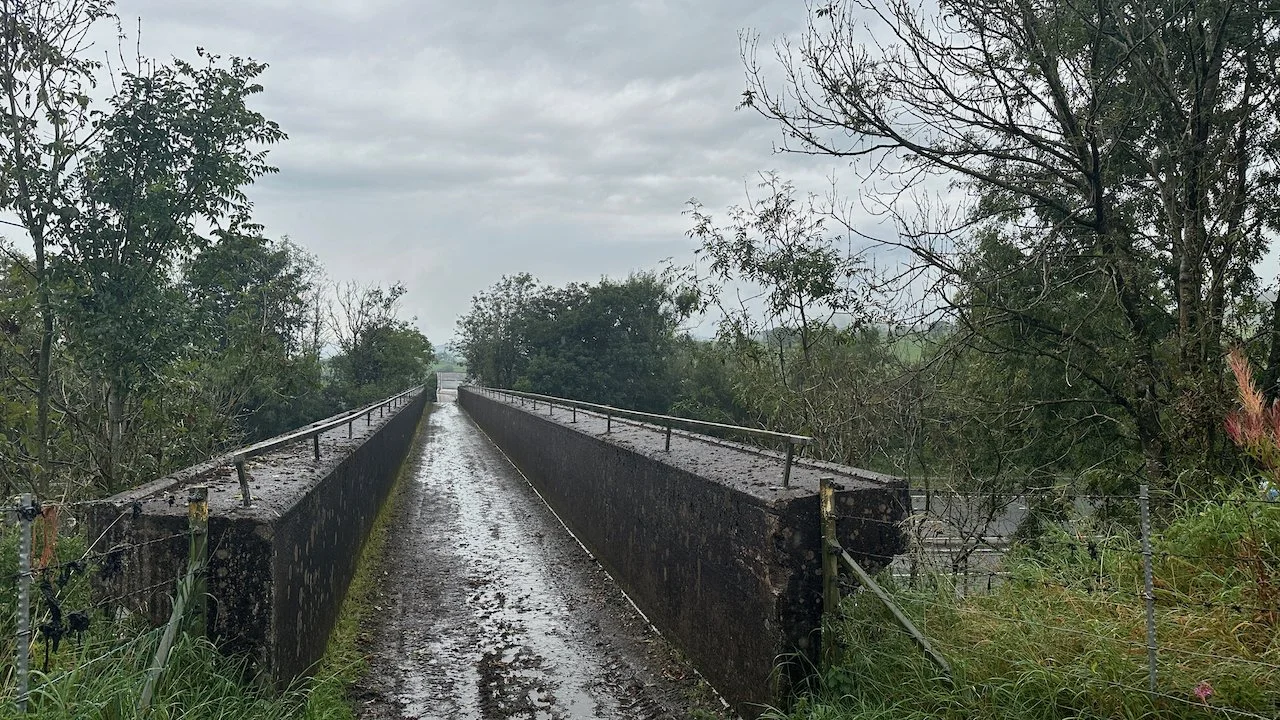  Pictures are a bit sketchy for the rest of the day. It rained too much to get out our cameras and maps. This is the bridge crossing the M6. 