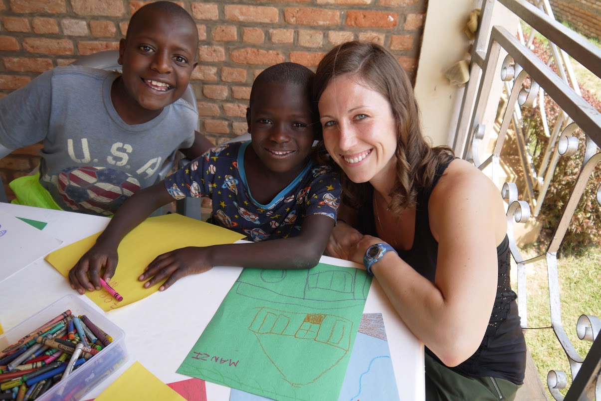 Carrie helping Manzi color with Amuran
