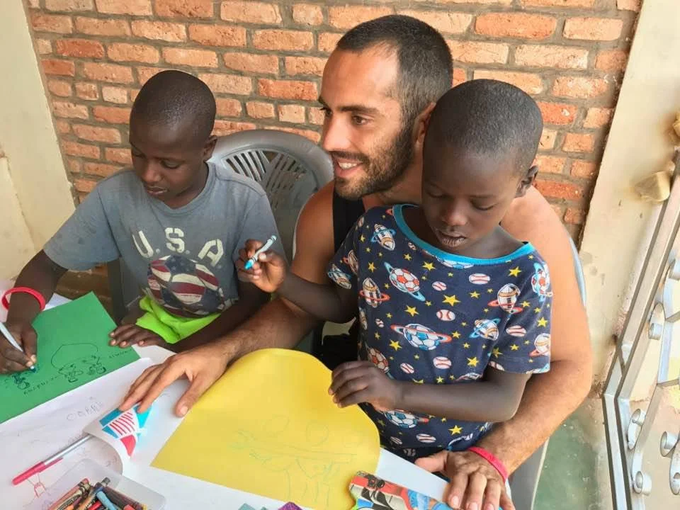 Trying to keep Manzi focused on his coloring for more than five seconds. Amuran couldn't stop though.
