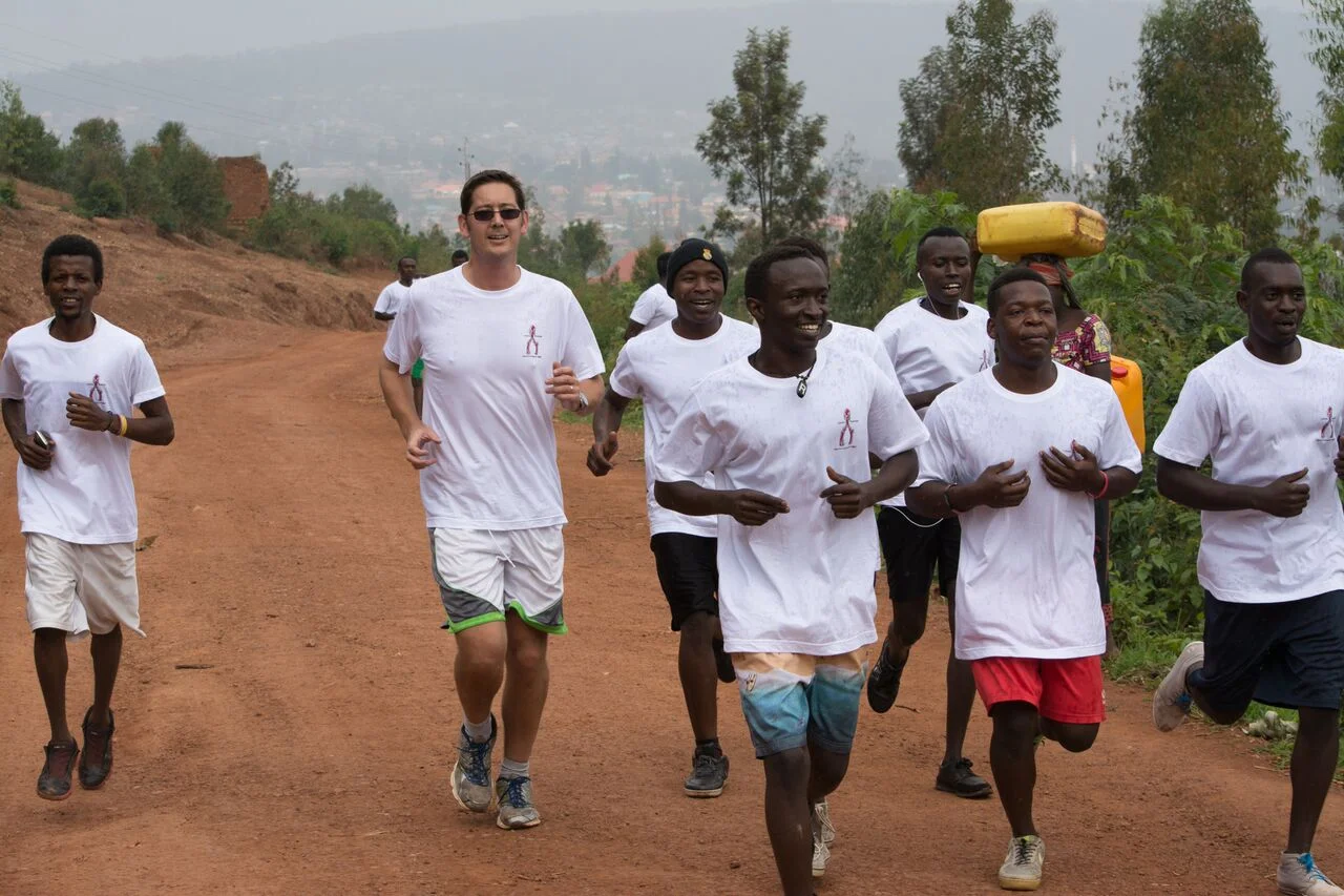 Some of our kids and Doug ( A volunteer) running