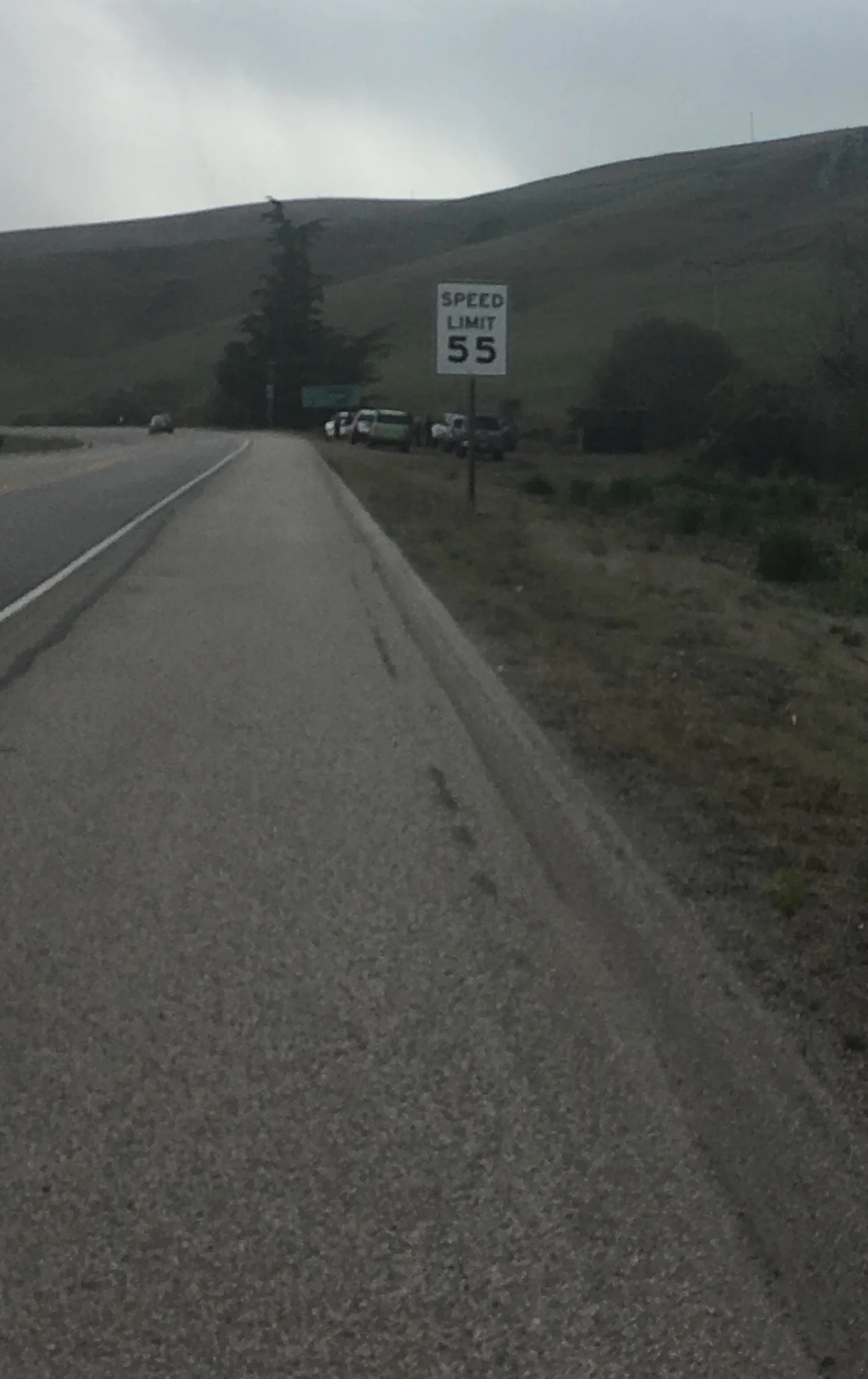 It’s a glorious feeling when you turn the bend and see a bunch of trucks waiting to support you. I took this crappy quality photo while crawling to them.