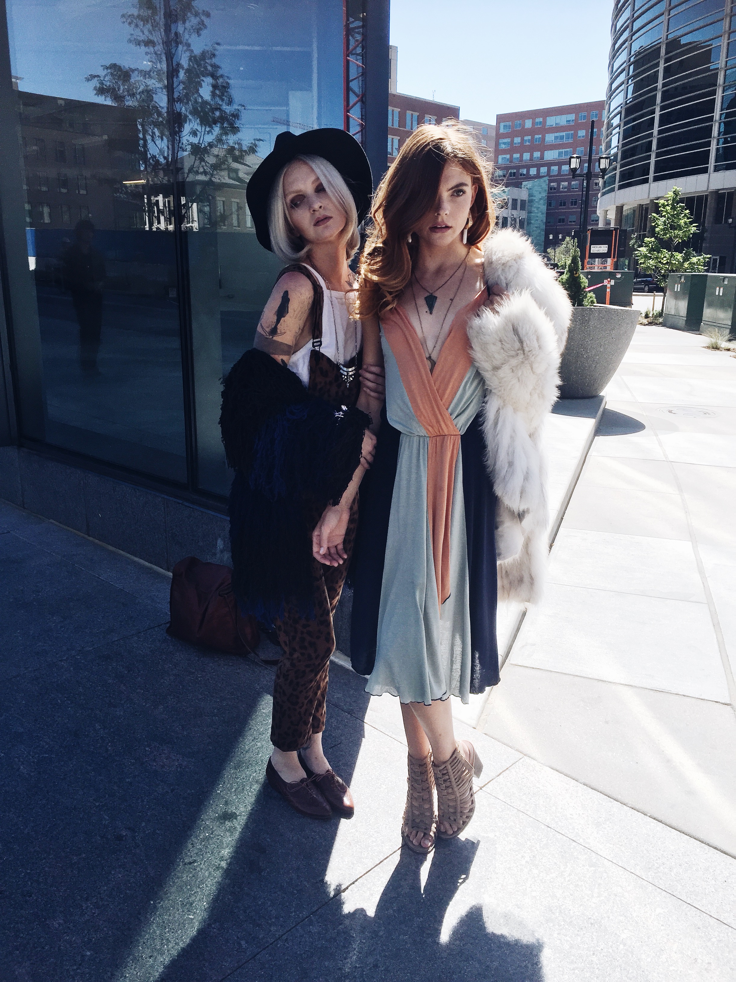 Kris and Alyssa in their streetwear glam rock outfits