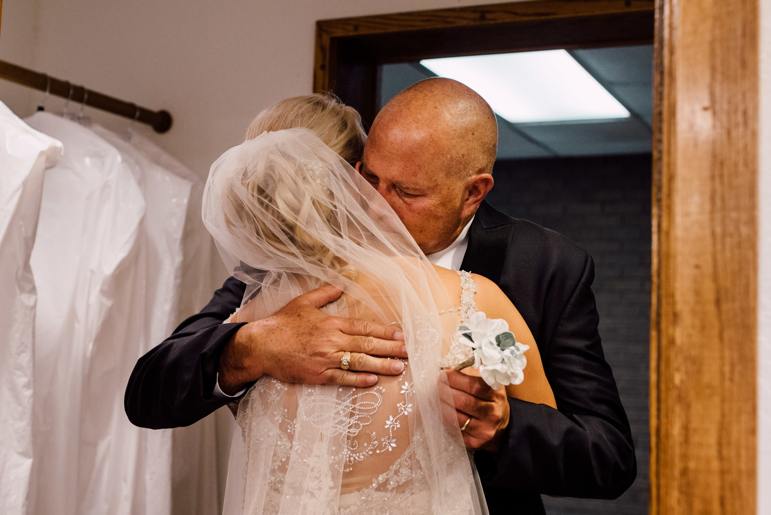 definitely cried behind the camera during the first look with dad