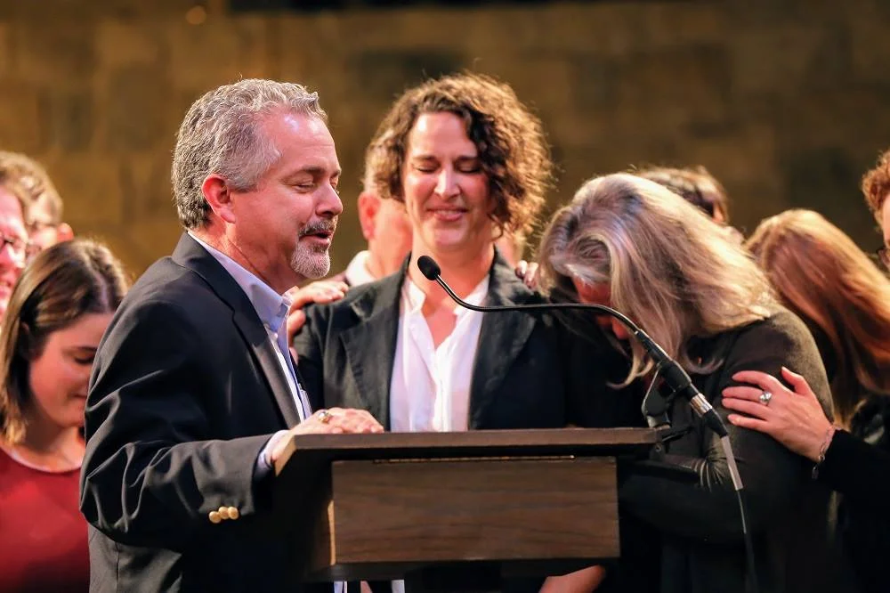 Rev. John D'Elia prays for Commissioned Ruling Elder Ashley Myers