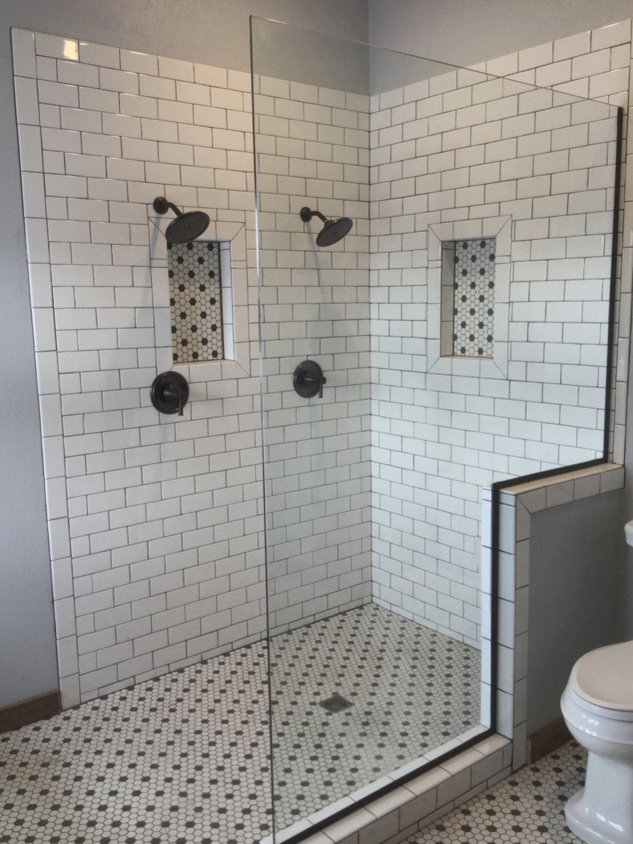 New walk-in shower with white tile.png