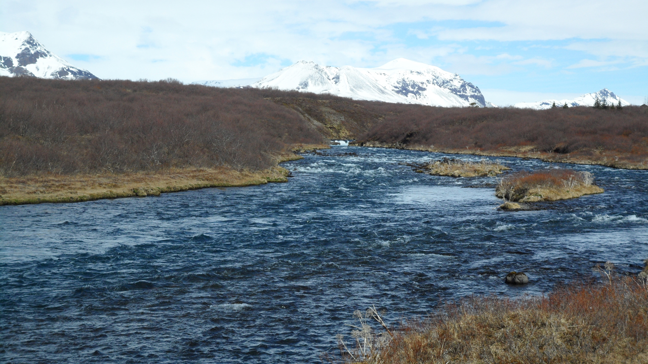 A hotel concierge gave us instructions on how to find a waterfall known as Bruarfoss. We didn't succeed in our first try, and later learned that some of the locals didn't like hikers driving through their neighborhood. So, the next day, we followed the river up to it instead.