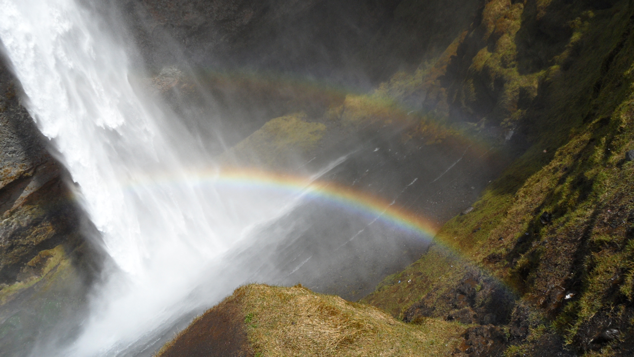 DOUBLE rainbow. At points, you could really, clearly see how a rainbow is a circle, but not in a good place to get a picture of it.