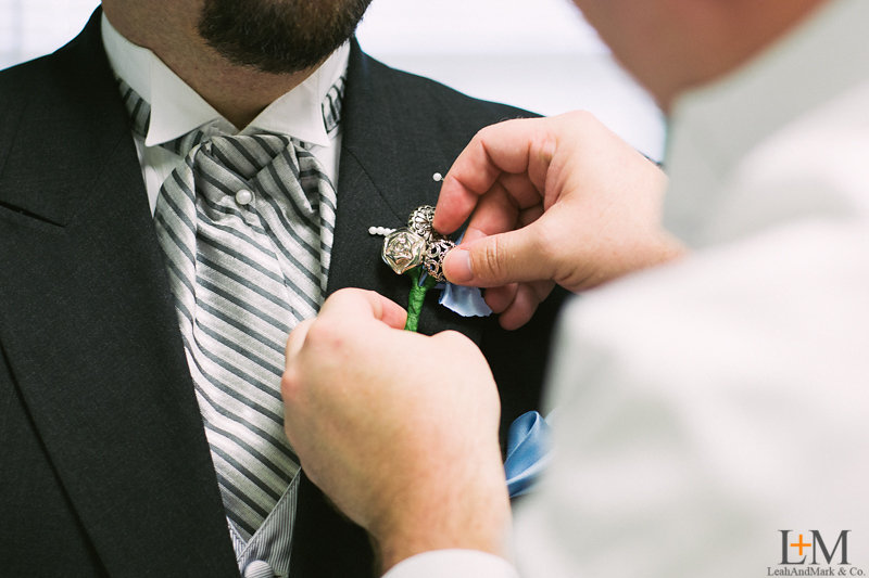 Tracy made the men's boutonnieres.
