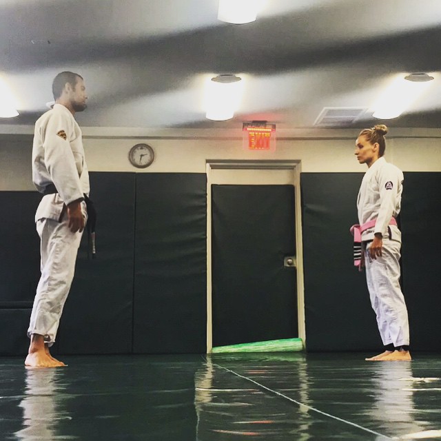 Angela sharpening tools with instructor Ryron Gracie days before #offthegridHAITI - 2015