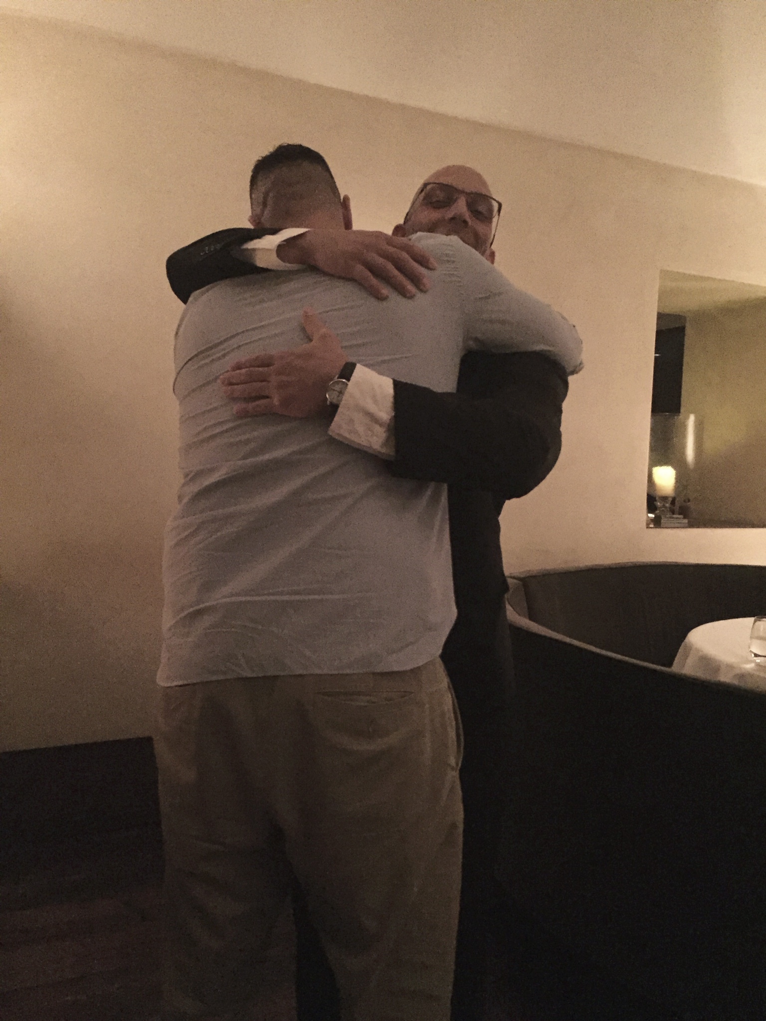 A warm embrace between two new friends.