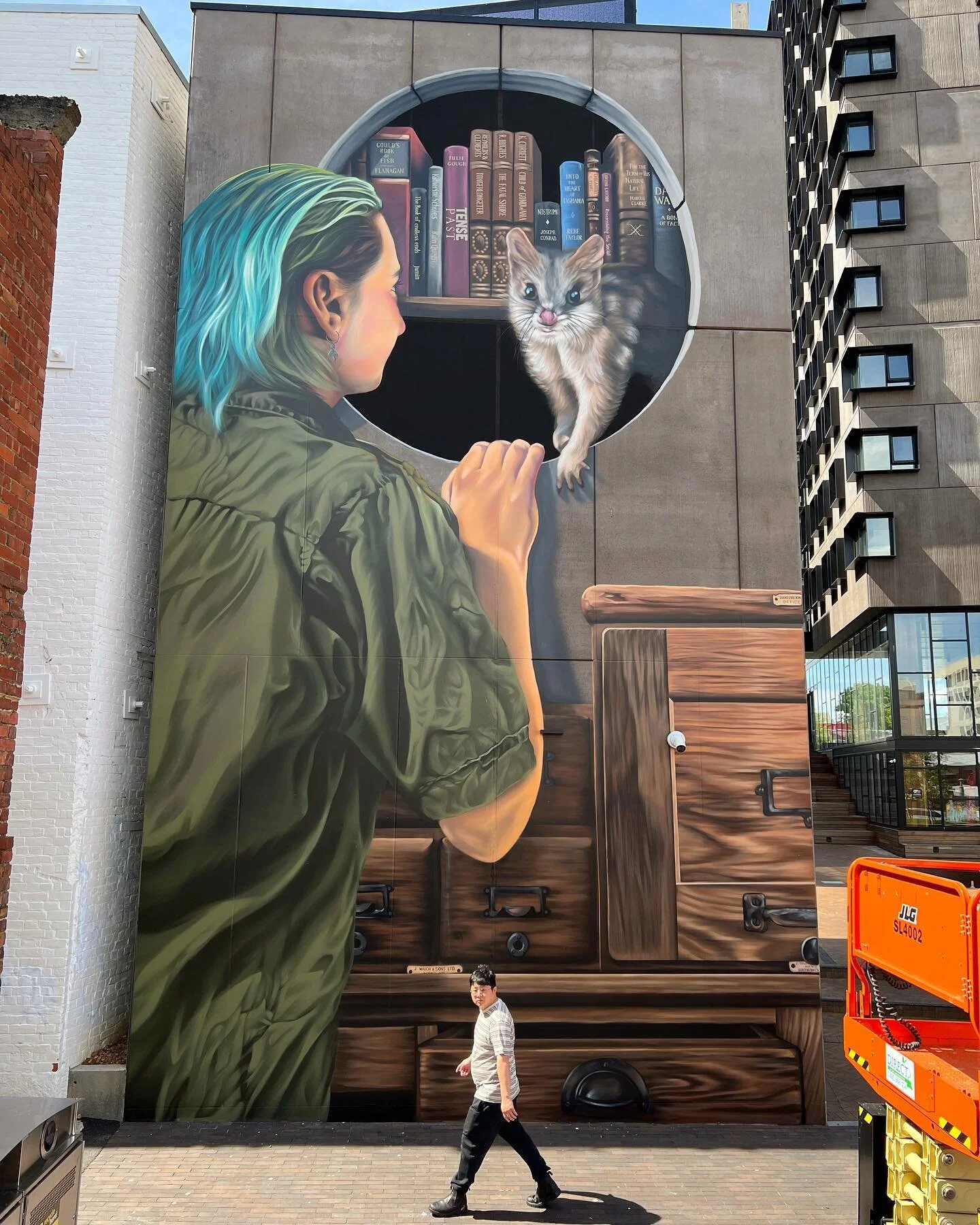 Woohoo! Just finished the final top coat on this mural, after cleaning off the bird poo! Thanks to local guy Tony for walking past just as I was balancing atop the ladder to get this shot. It was hot and sweaty work in the warm weather, but so good t