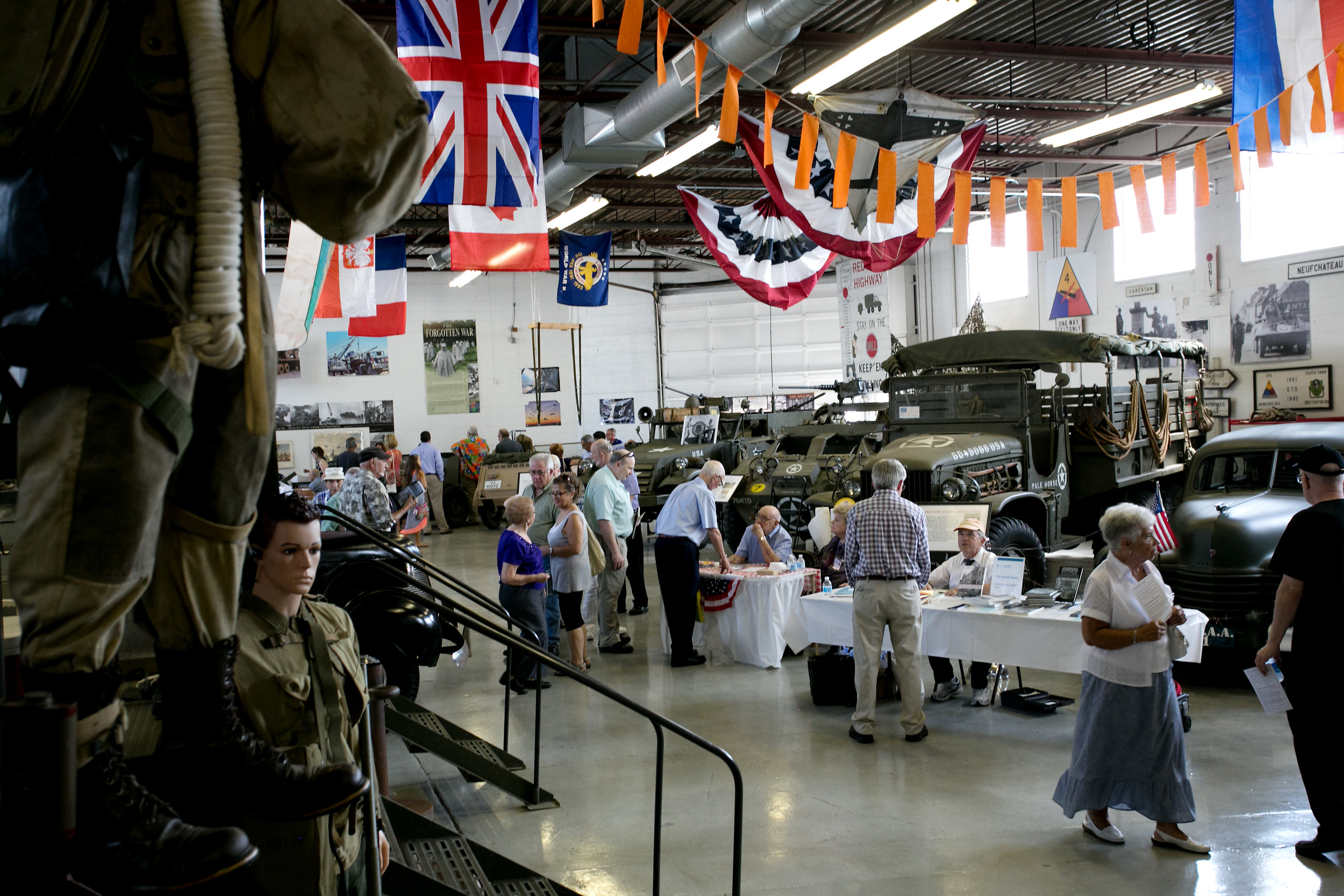 Long shot book table and banners.jpg