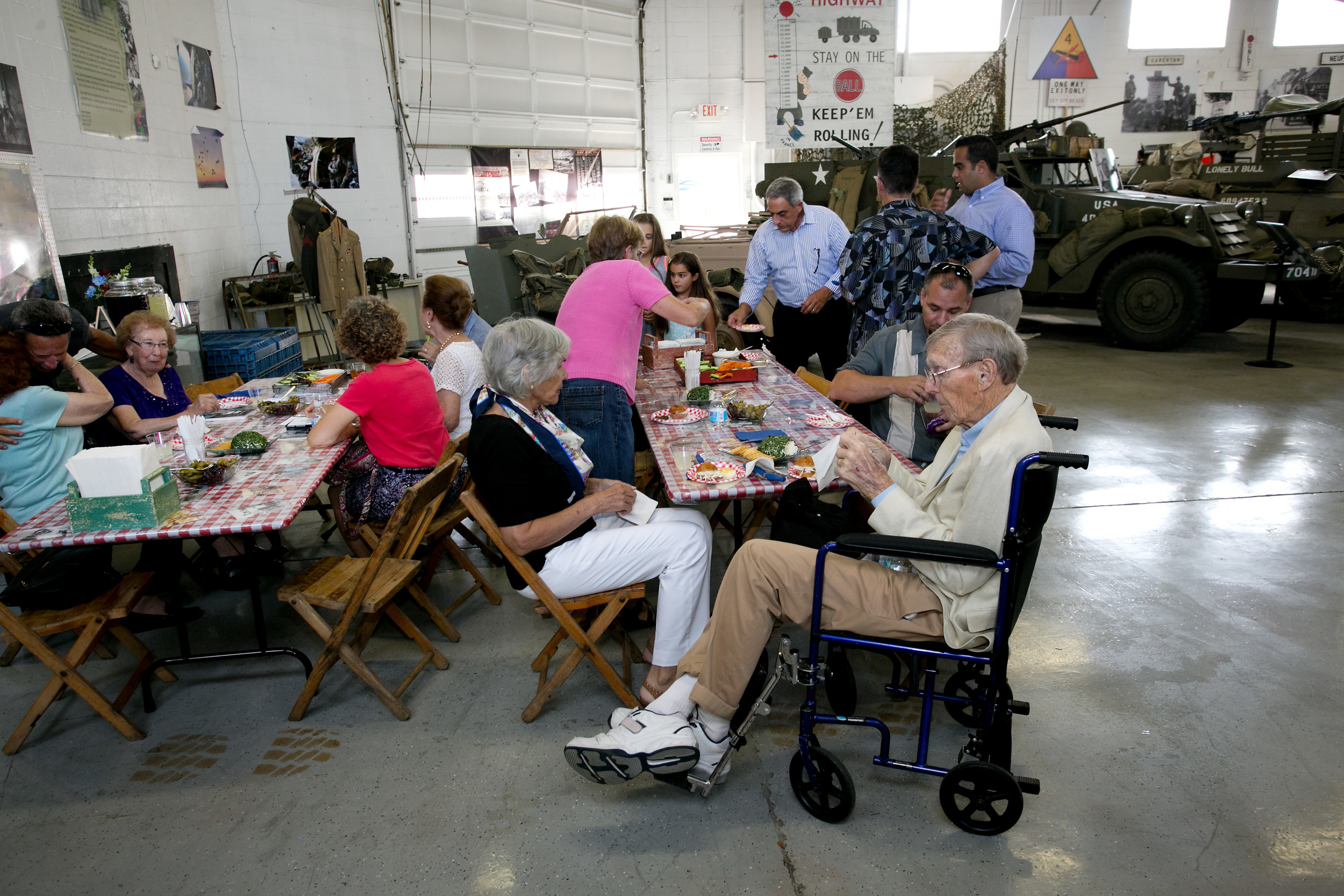 Ed Wolff and Margaret Pigott w others at refreshment tables.jpg