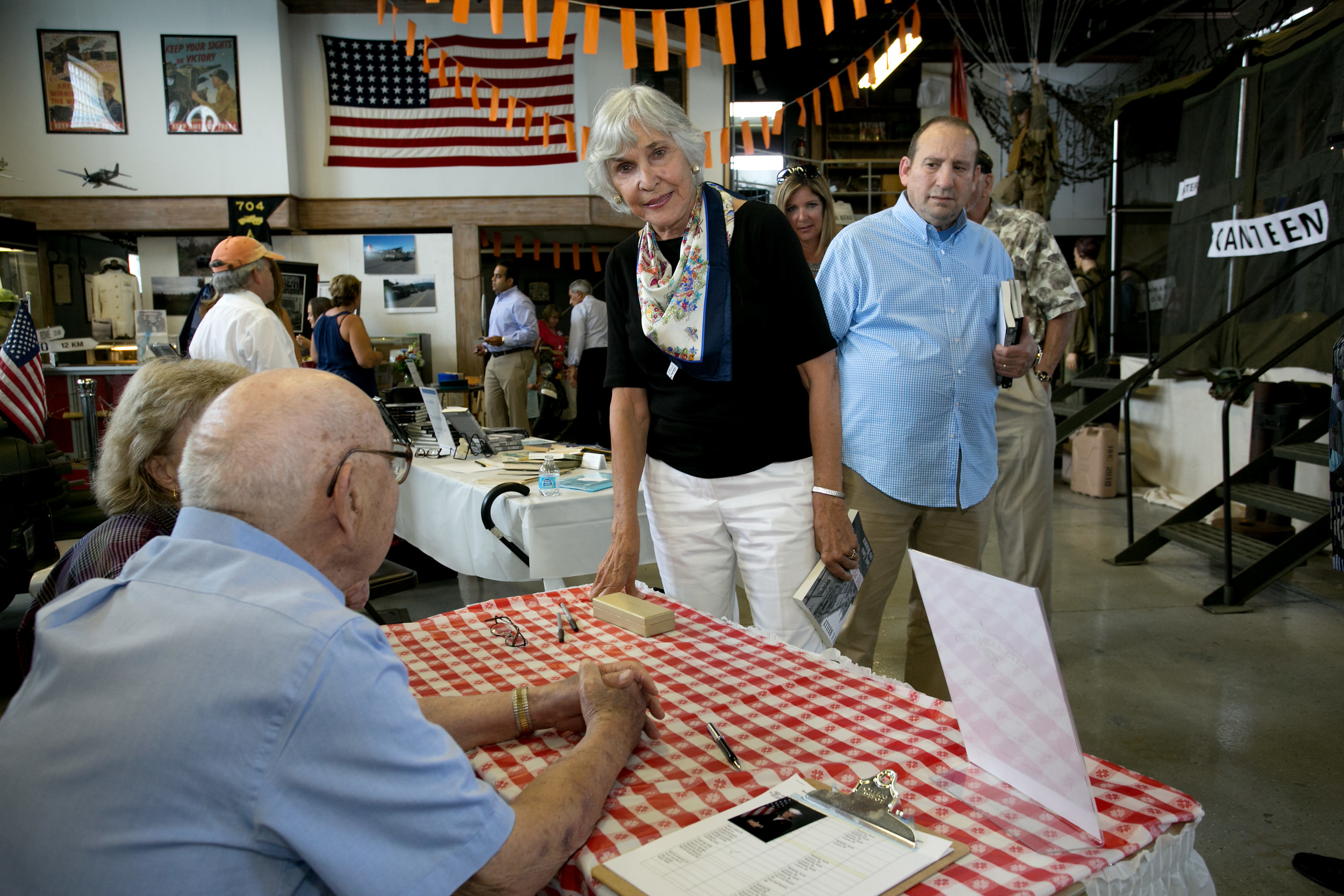 Margaret Pigott and David English at book signing table.jpg