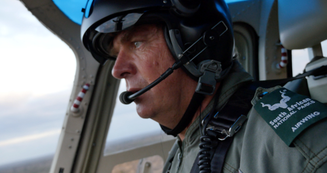 Pilot Tokkie Botes on a mission for rhinos