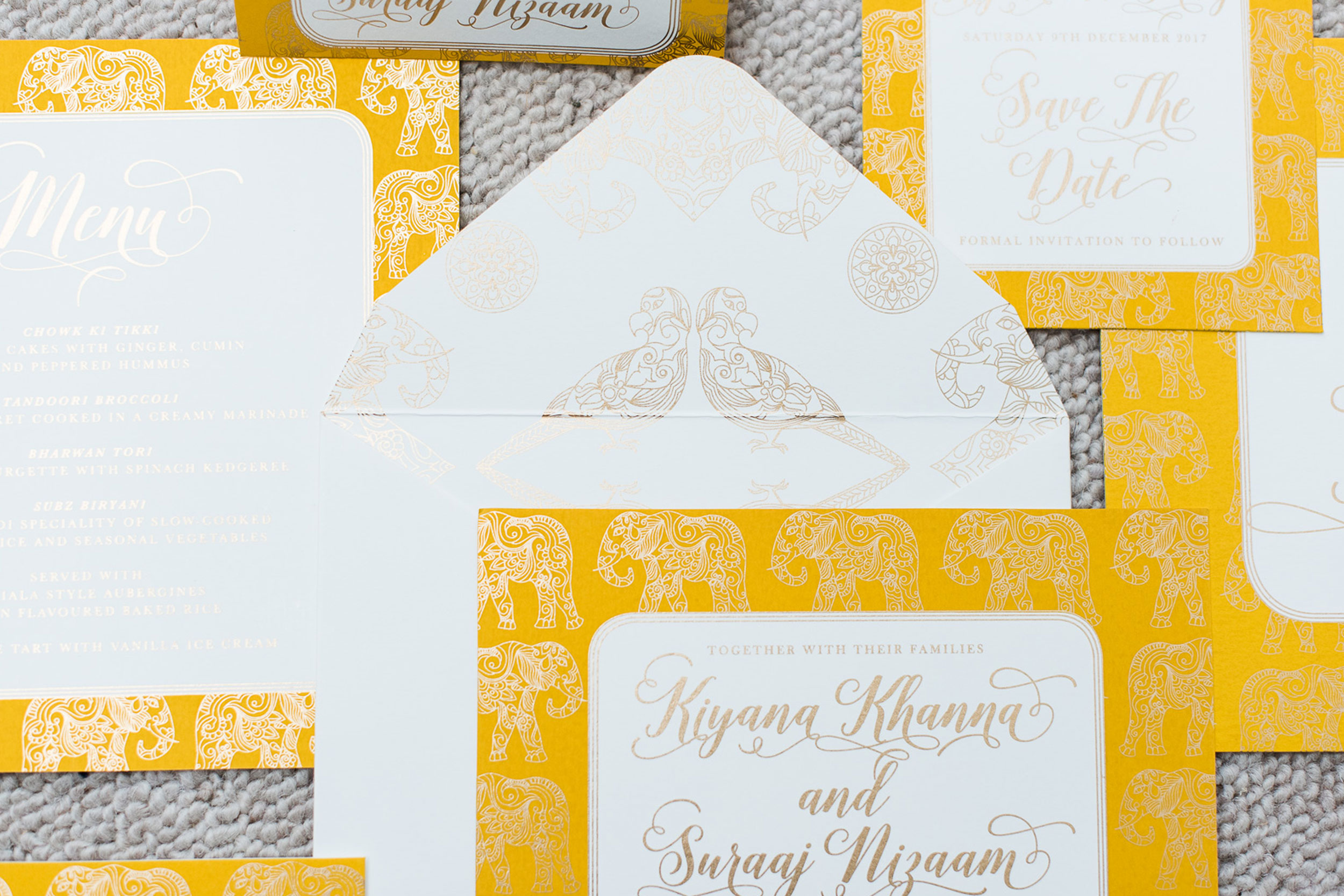 trio-of-life-gold-elephant-envelope-wedding-invitation.jpg