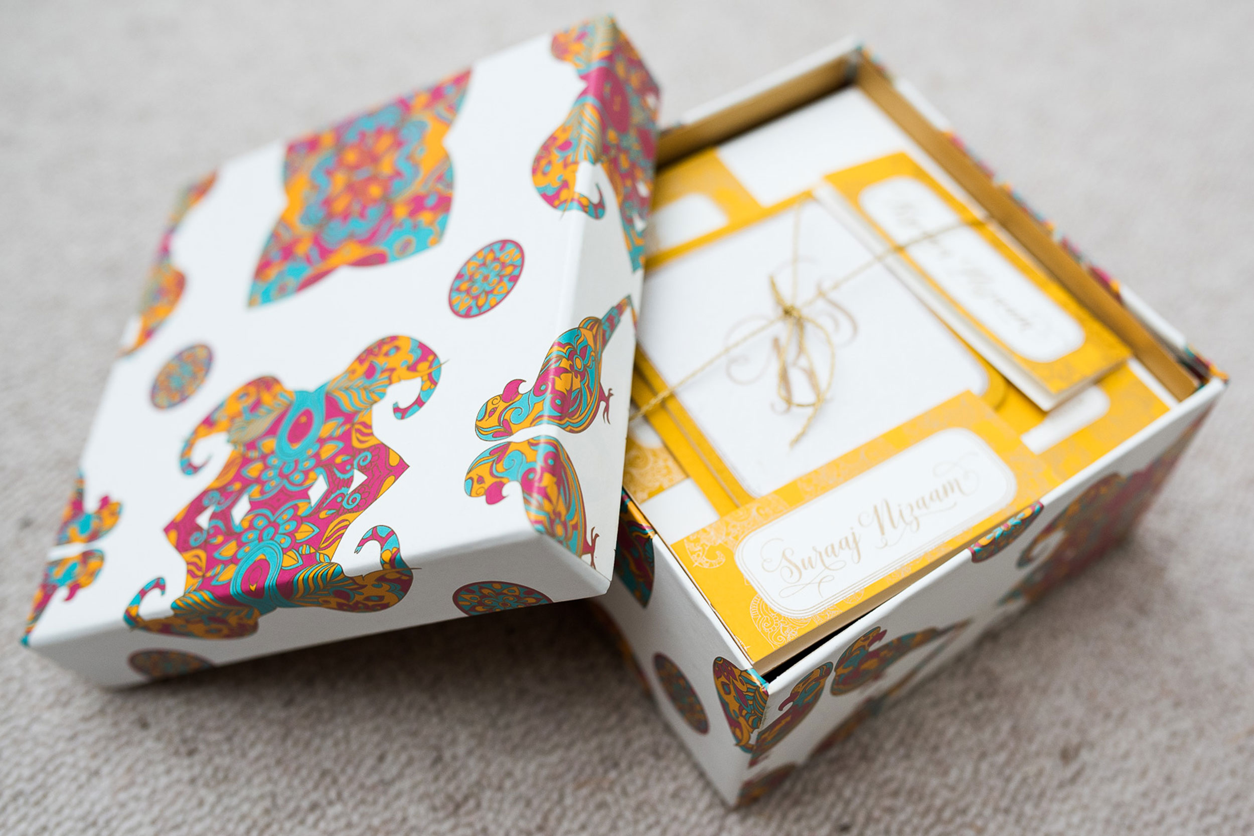 trio-of-life-gold-elephant-box-set-wedding-invitation.jpg
