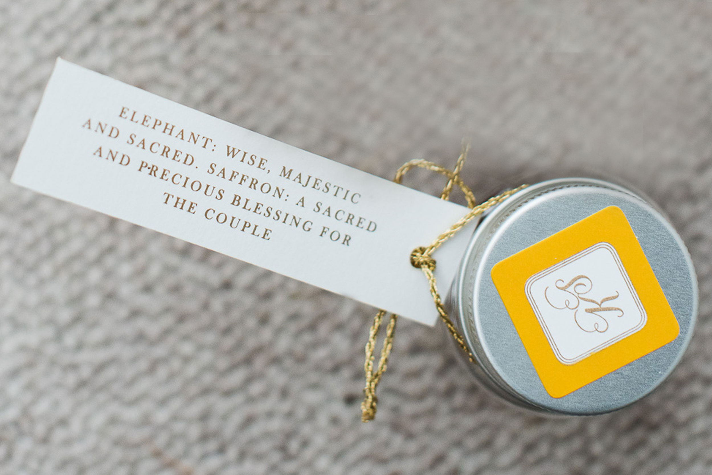 trio-of-life-gold-elephant-jar-wedding-invitation.jpg