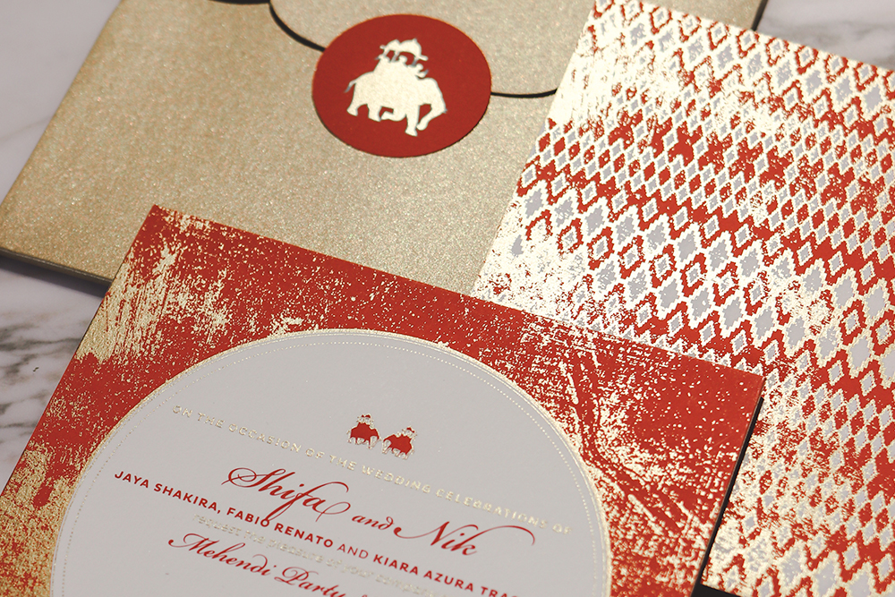 orange-gold-bespoke-indian-weddings-invitation.jpg