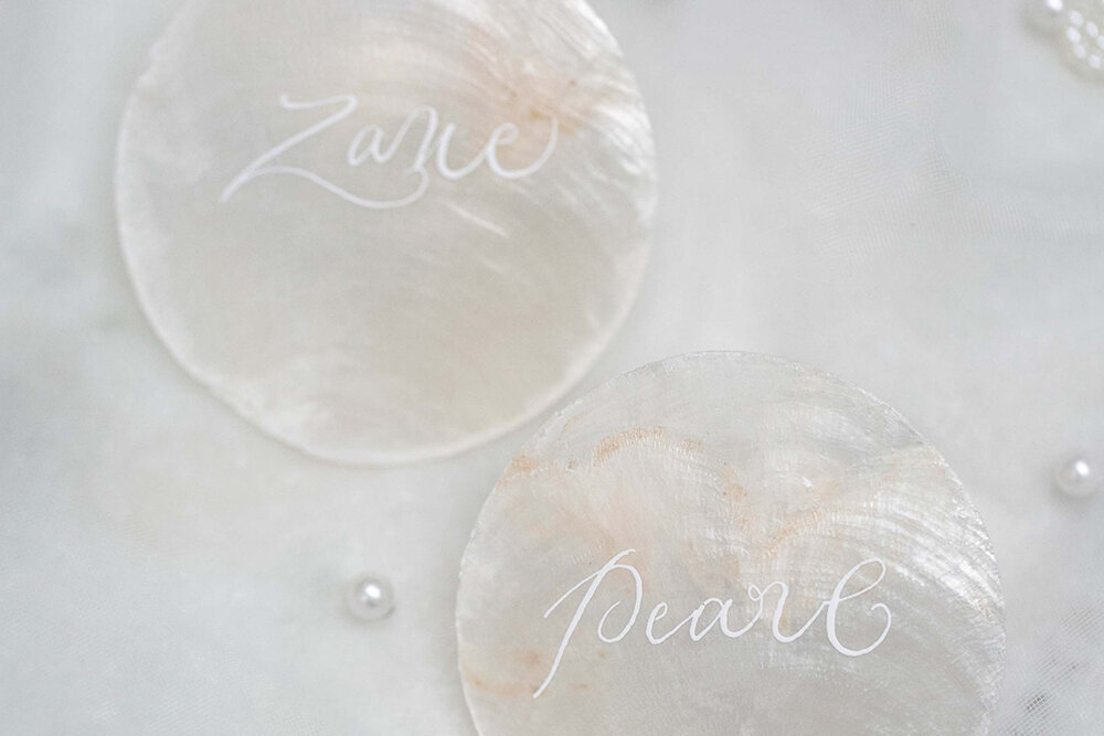 Pearl-Wedding-Inspiration-Anneli-Marinovich-Photography-calligraphy pearl disc placecards_ananyacards.com.jpg