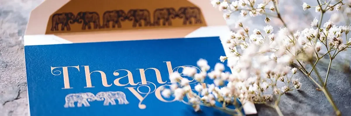 Elephant design thank you card on royal blue card