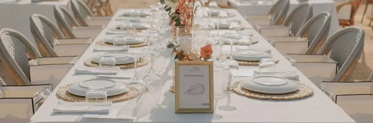 Dubai Wedding Symposium table name in gold frame on luxury table setting