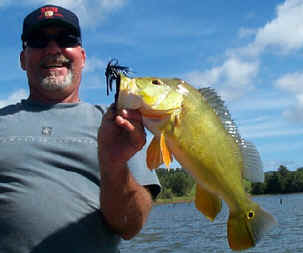 Guide Tom Christy with Peacock Bass on Kauai