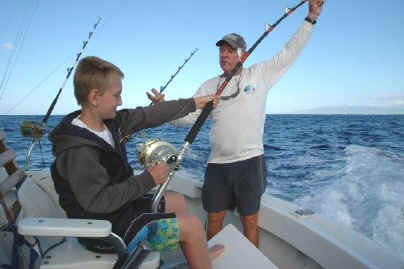 Hawaii fishing charter kid fishing