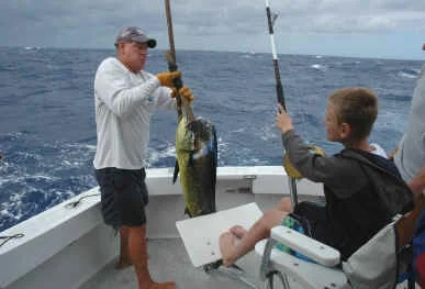 Kid's learning to fish in Hawaii