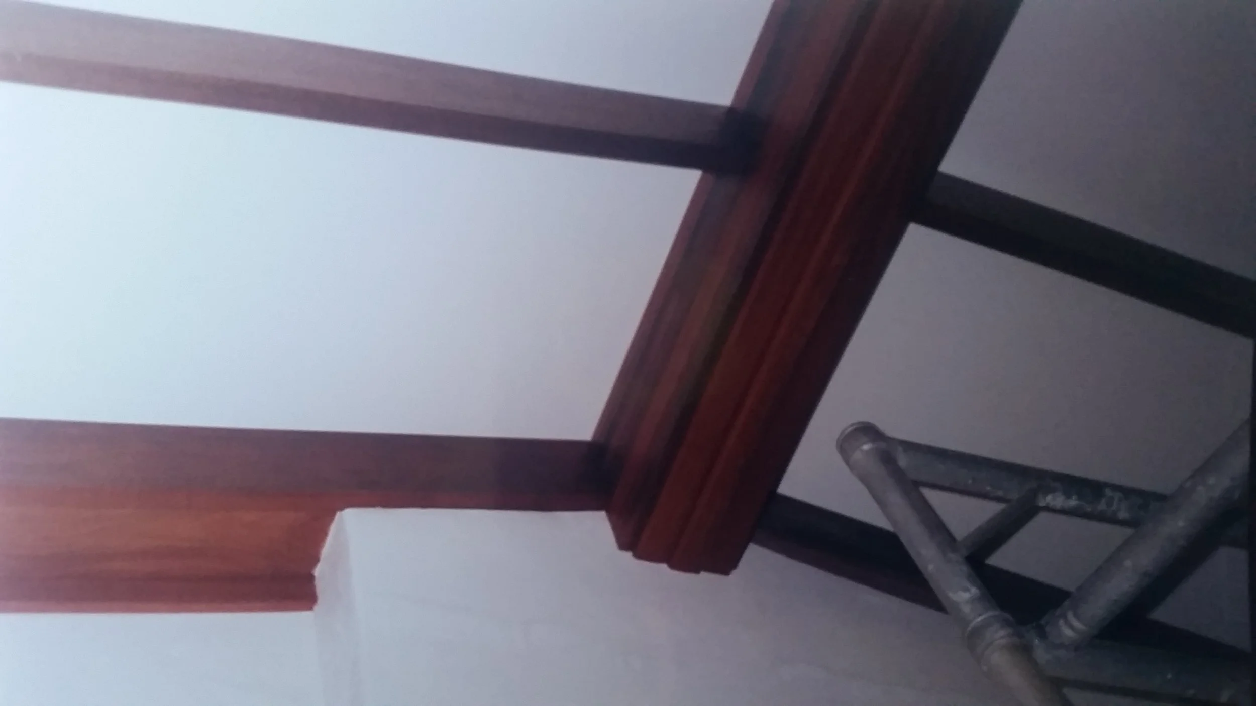 Brickwork completed, plasterwork done, exposed jarrah beams lacquered.