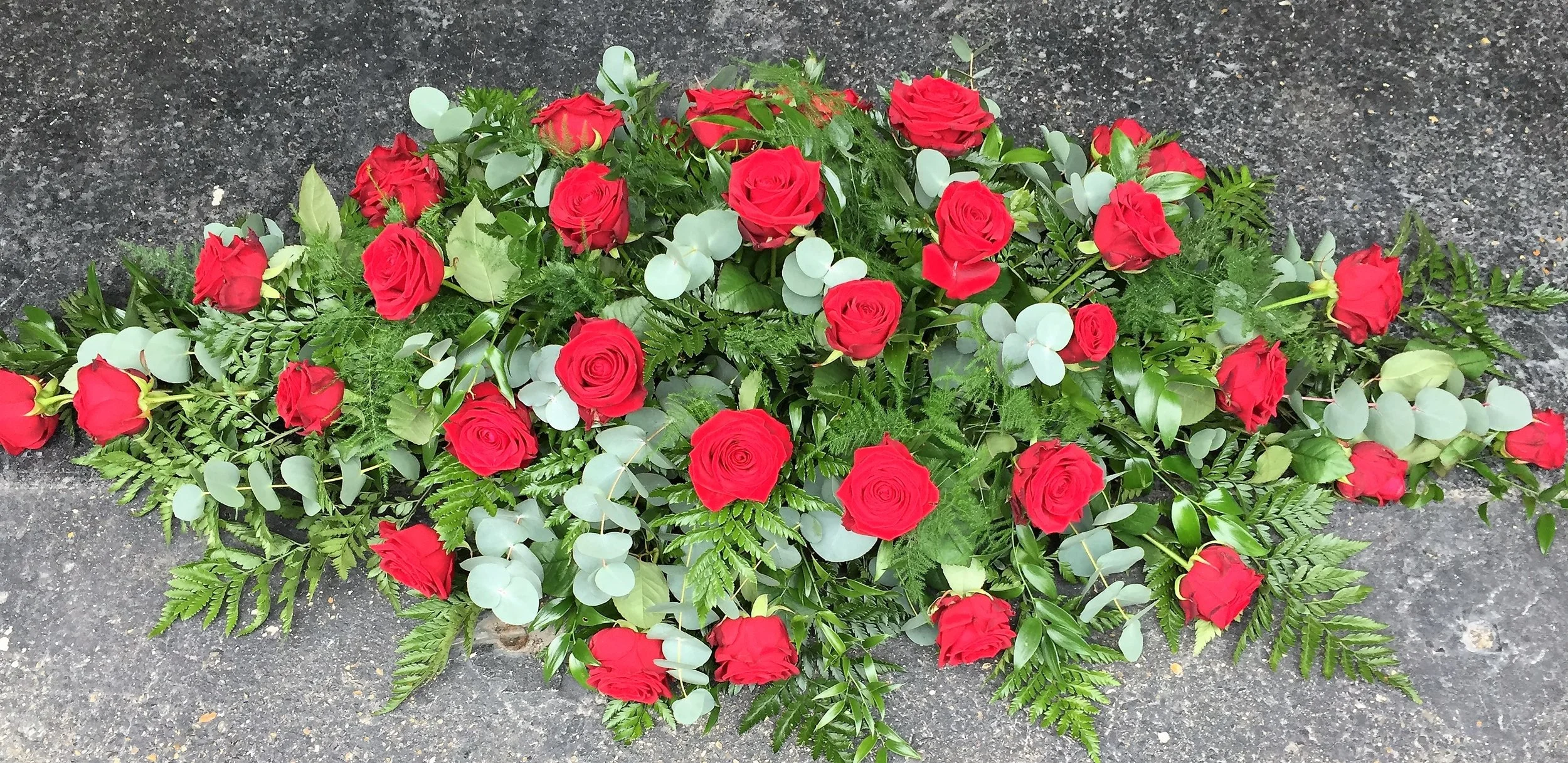 Red rose casket spray 