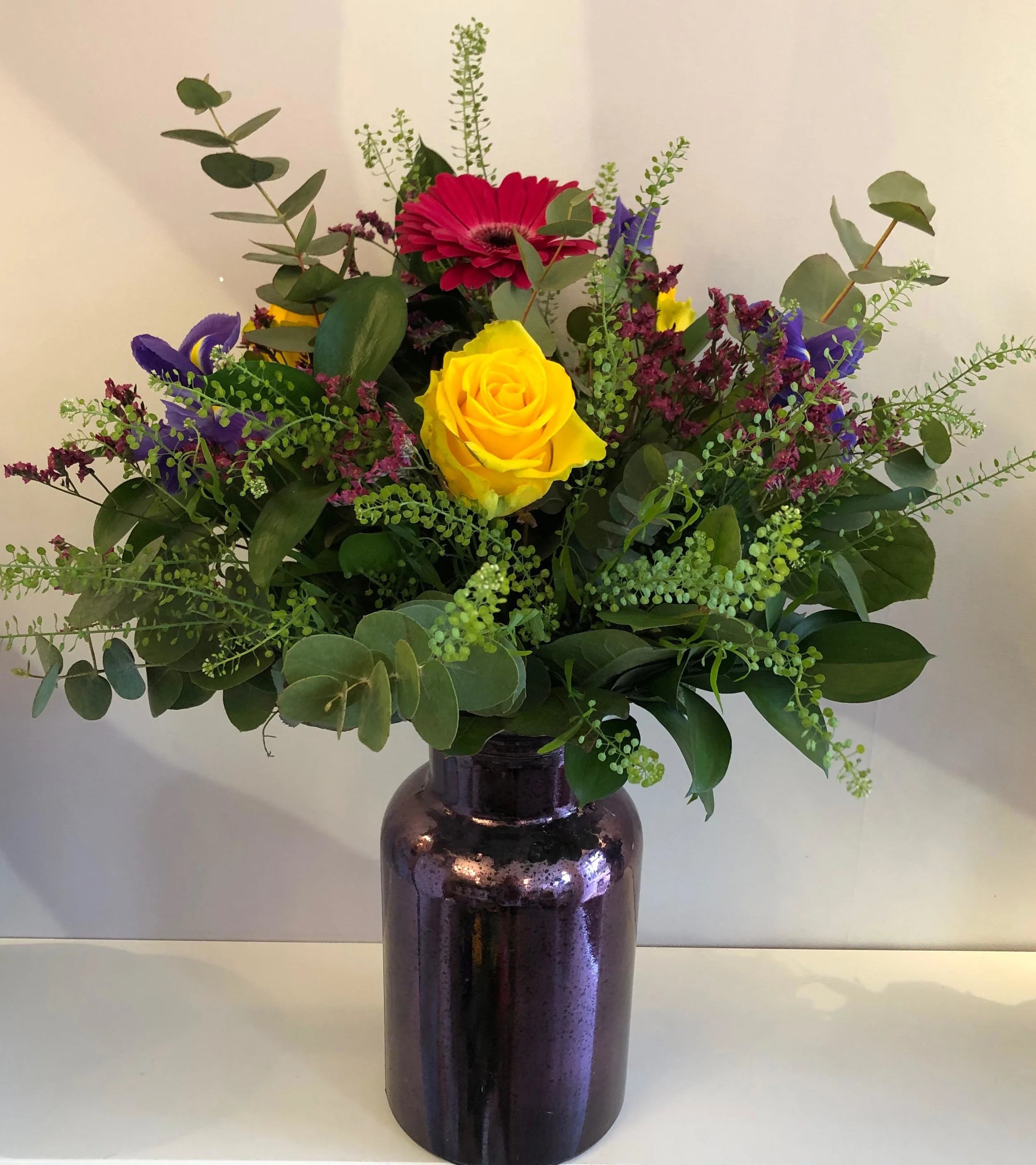 Seasonal hand tied vase arrangement