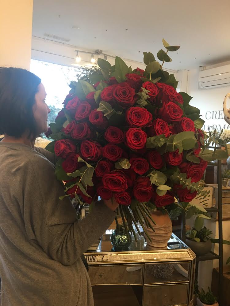100 red Naomi rose bouquet