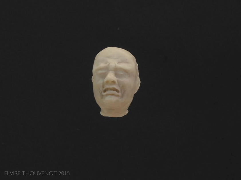 I first made a miniature wax head to quickly sketch out the main features of this facial expression, such as the 'brow of grief', the deepened nasolabial fold, and the tightness in the lower face.