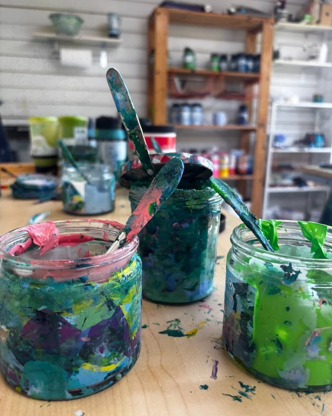 In this hot weather I have to keep putting the lids back on the paint jars else the paint dries up.  Ooops! ⁠
That also means that I have to work really quickly on the canvas!