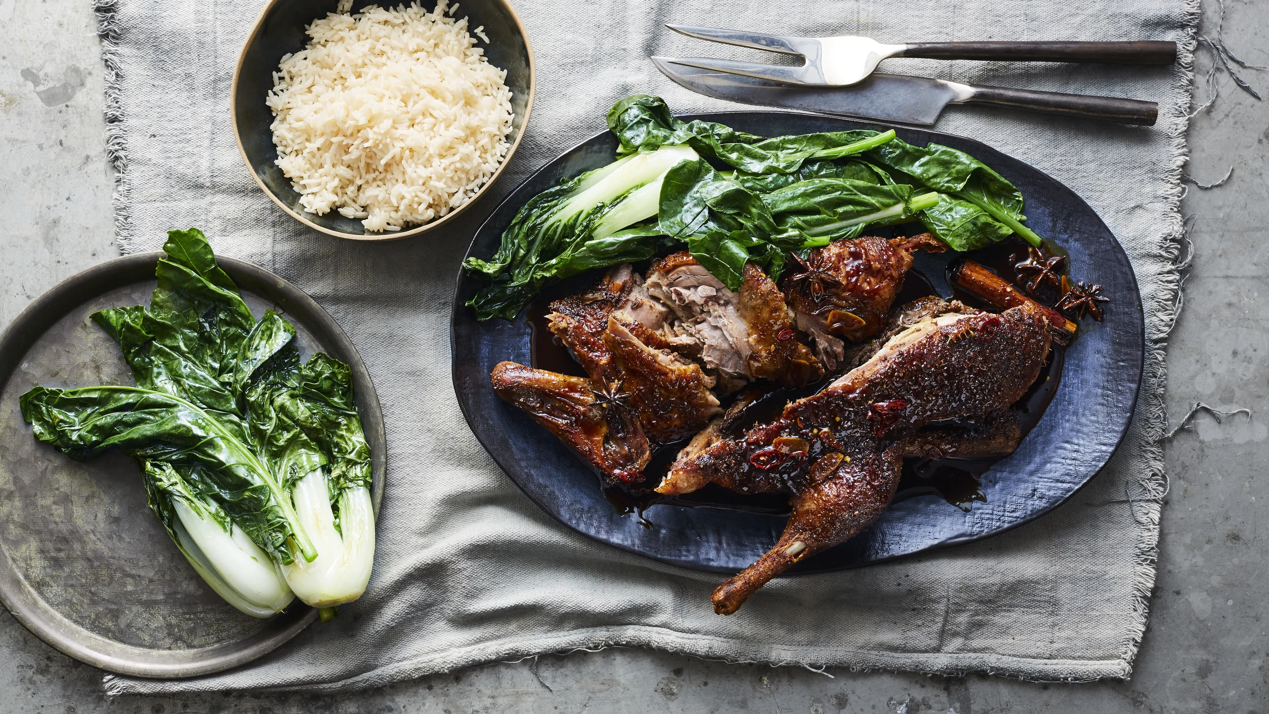 Spiced-honey roasted duck with rice and asian greens, Photography: Brett Stevens, Art Direction: Anne Marie Cummins, Food & Props Styling: Marcus Hay for SMH, Inc 