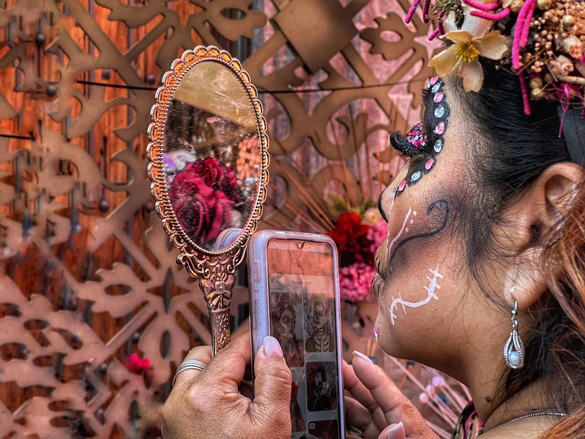 Woman mirror and phone.jpeg