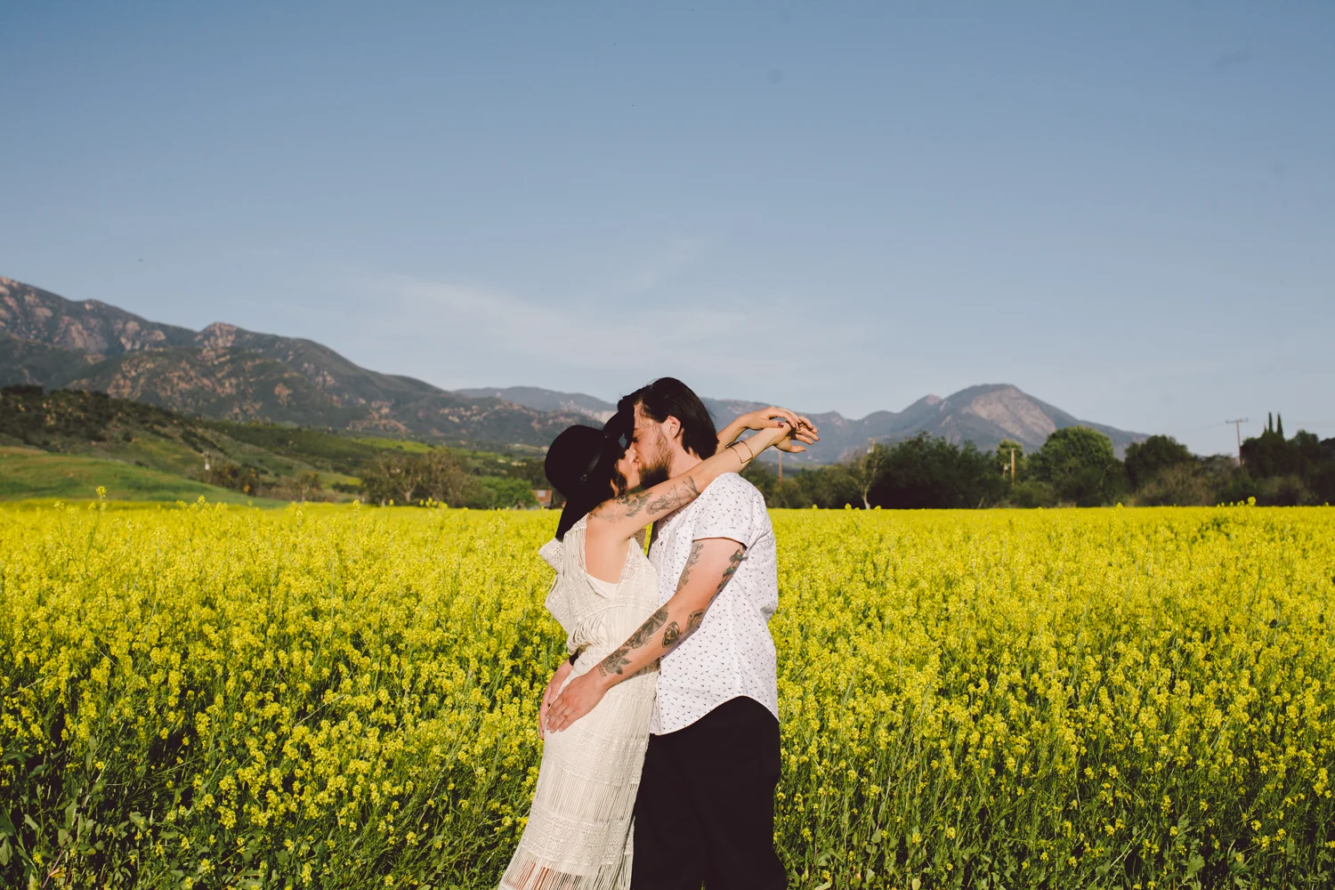 Non-traditional elopement. Spring Bloom Bohemian Elopement Wedding Portraits in a field in Ojai, California. Wedding Inspiration. Planning & Design Art & Soul Events. Photographer Evangeline Lane