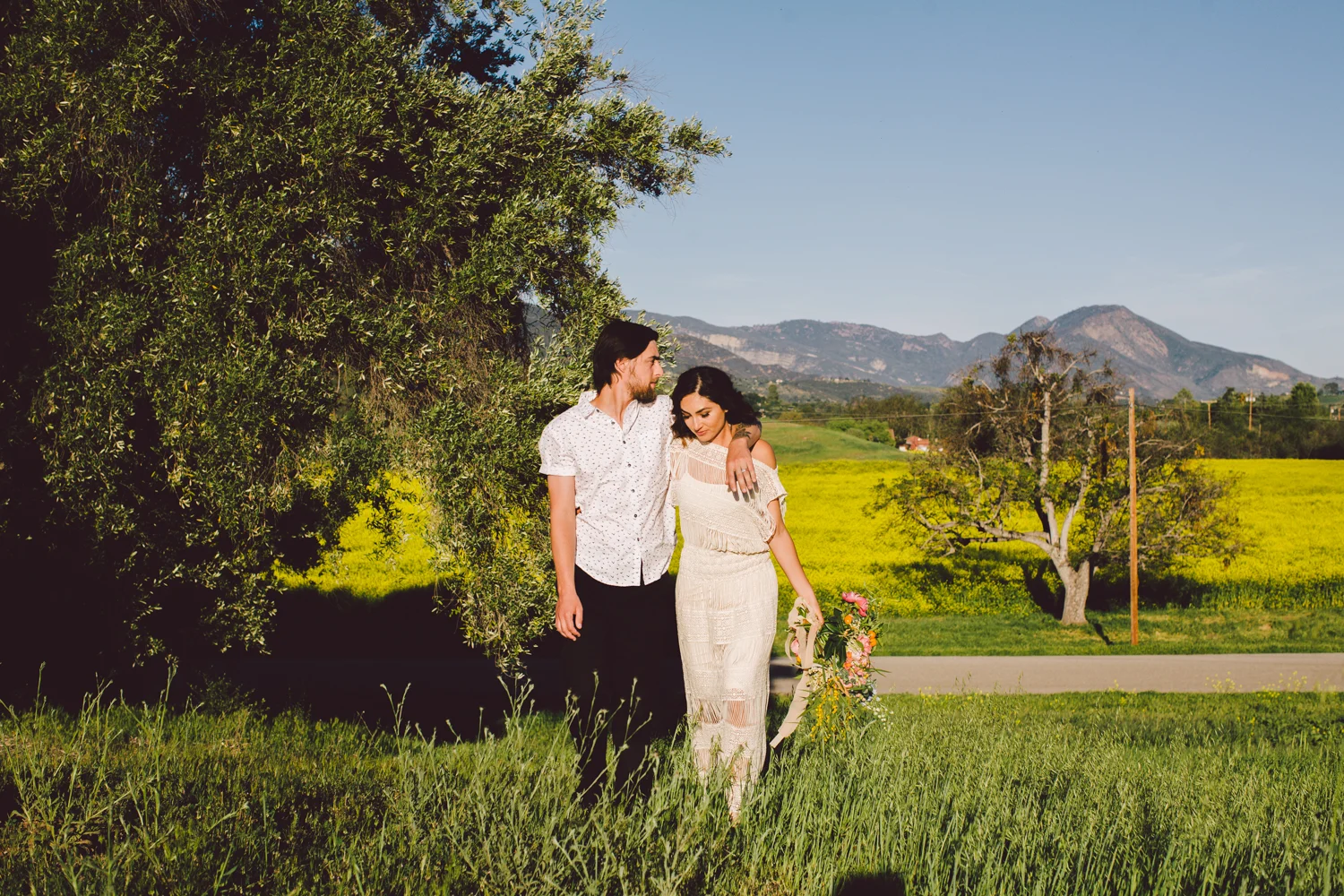 Non-traditional elopement. Spring Bloom Bohemian Elopement Wedding Portraits in a field in Ojai, California. Wedding Inspiration. Planning & Design Art & Soul Events. Photographer Evangeline Lane