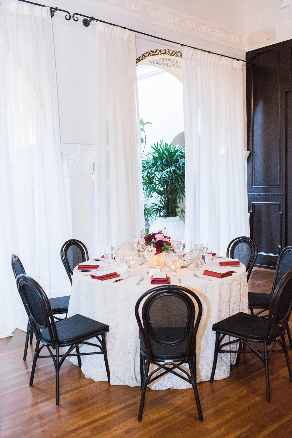 Ebell Club of Long Beach. California Wedding Venue, Jewish Wedding Reception, Photographer Casey Brodley, White round table, black bistro chairs