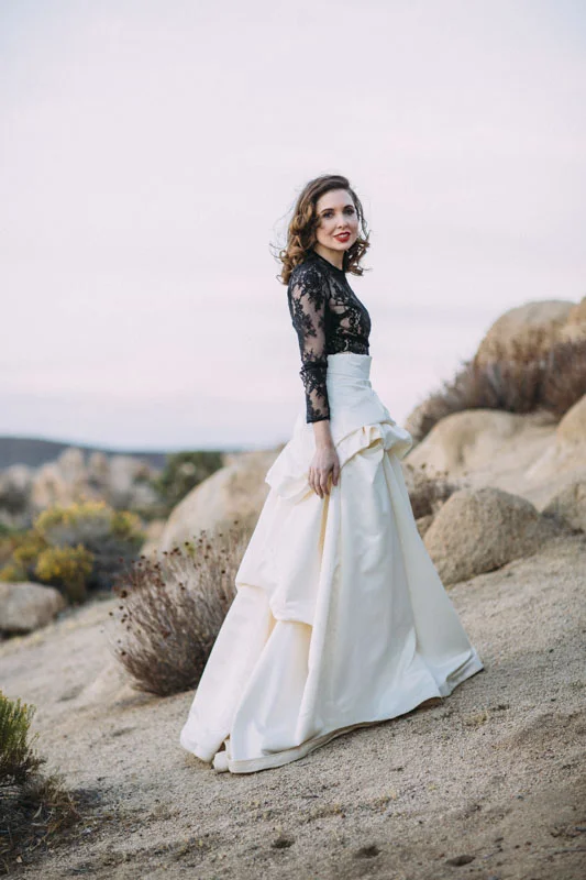 Talawahee Ranch Wedding, Joshua Tree Wedding Venue, Bride with a white satin skirt and black lace top, Yucca Valley Desert Wedding, Planning and Design: Art & Soul Events LGBTQ Wedding Planner