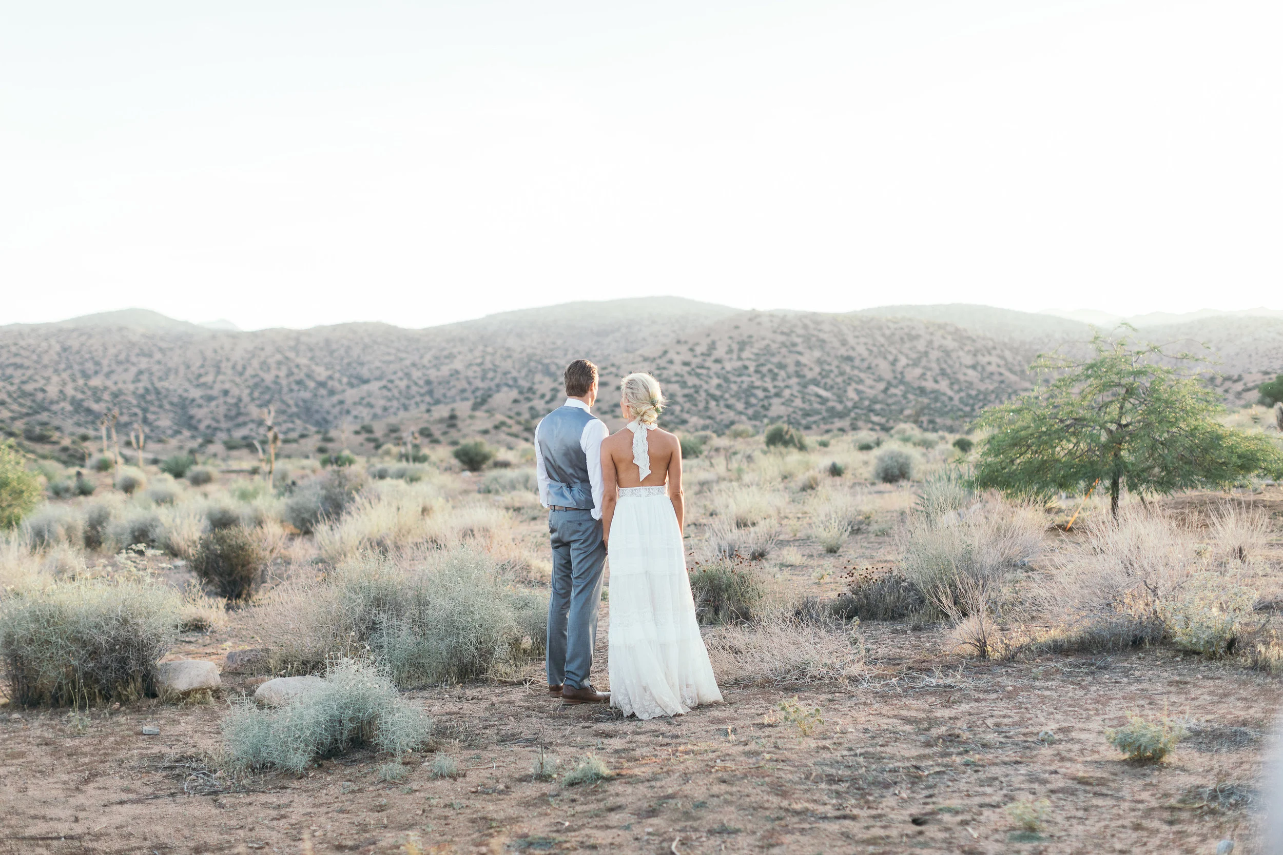 Bohemian Wedding, Triangle Ceremony Arch, Spell & The Gypsy Boho Bride Halter Dress, Rimrock Ranch Desert Wedding Venue, Pioneertown, California, Art & Soul Events, Kiel Rucker Photography