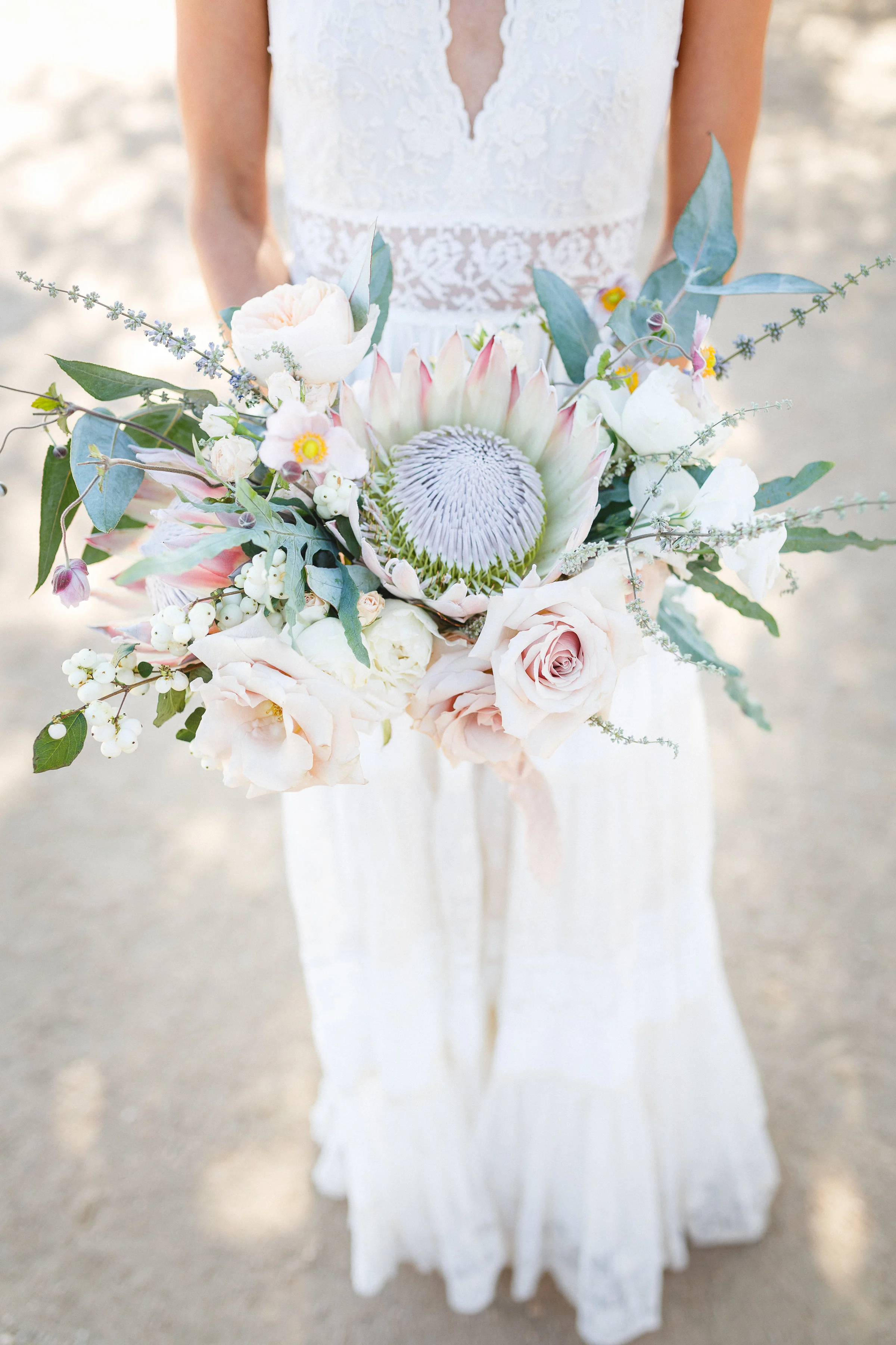 Boho Bridal Bouquet, King Protea, Angelica Halter Gown, Spell & Gypsy, Rimrock Ranch Desert Wedding Venue, Pioneertown, California, Art & Soul Events, Kiel Rucker Photography