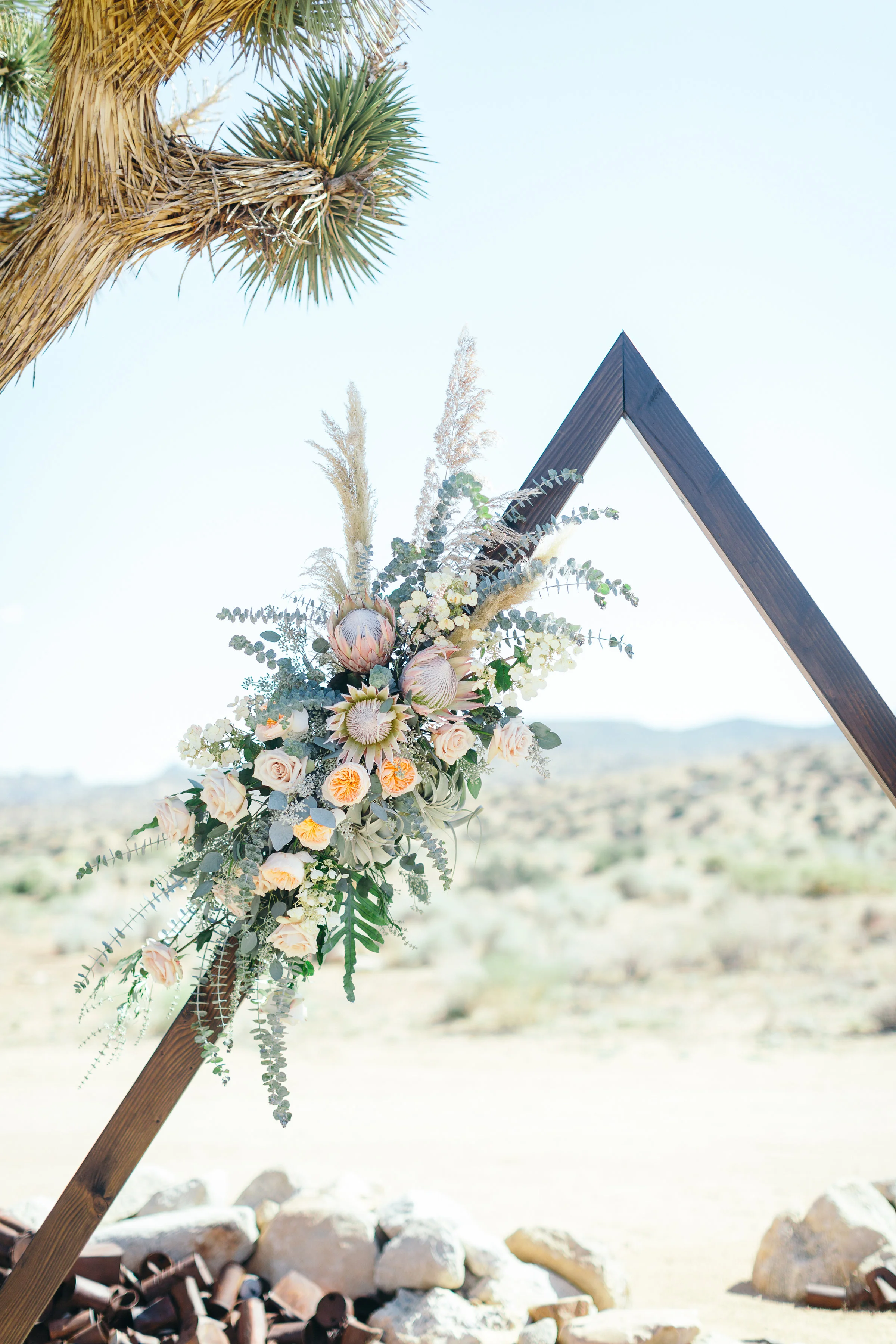 Bohemian Wedding, Triangle Ceremony Arch, King Protea, Rimrock Ranch Desert Wedding Venue, Pioneertown, California, Art & Soul Events, Kiel Rucker Photography, Bloom Babes