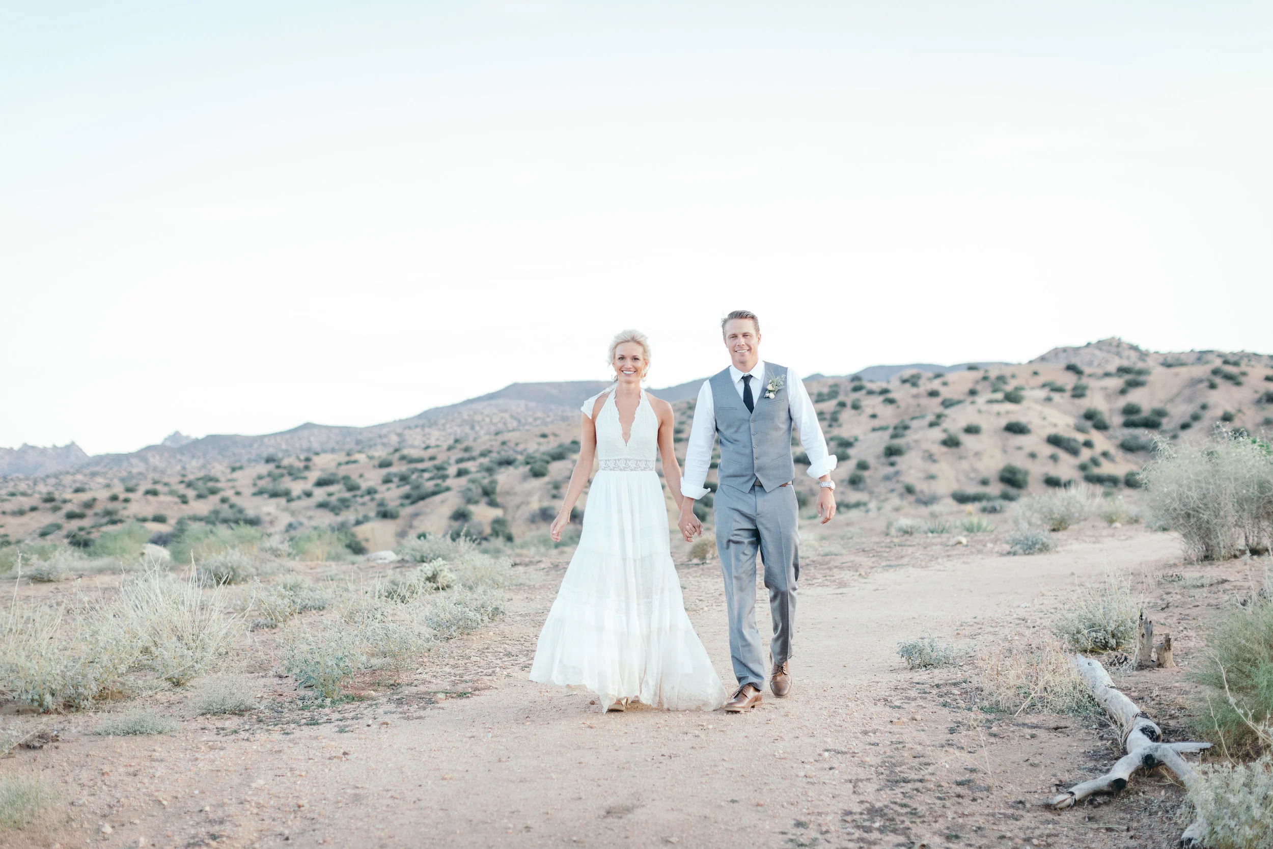 Bohemian Wedding, Triangle Ceremony Arch, Spell & The Gypsy Boho Bride Halter Dress, Rimrock Ranch Desert Wedding Venue, Pioneertown, California, Art & Soul Events, Kiel Rucker Photography