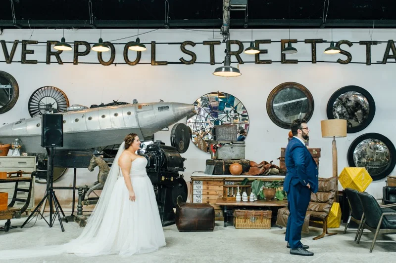 First Look Wedding Portraits, Eclectic Wedding at Big Daddy's Antiques Los Angeles, Groom in a blue suit, Della Curva Bride, Art & Soul Events