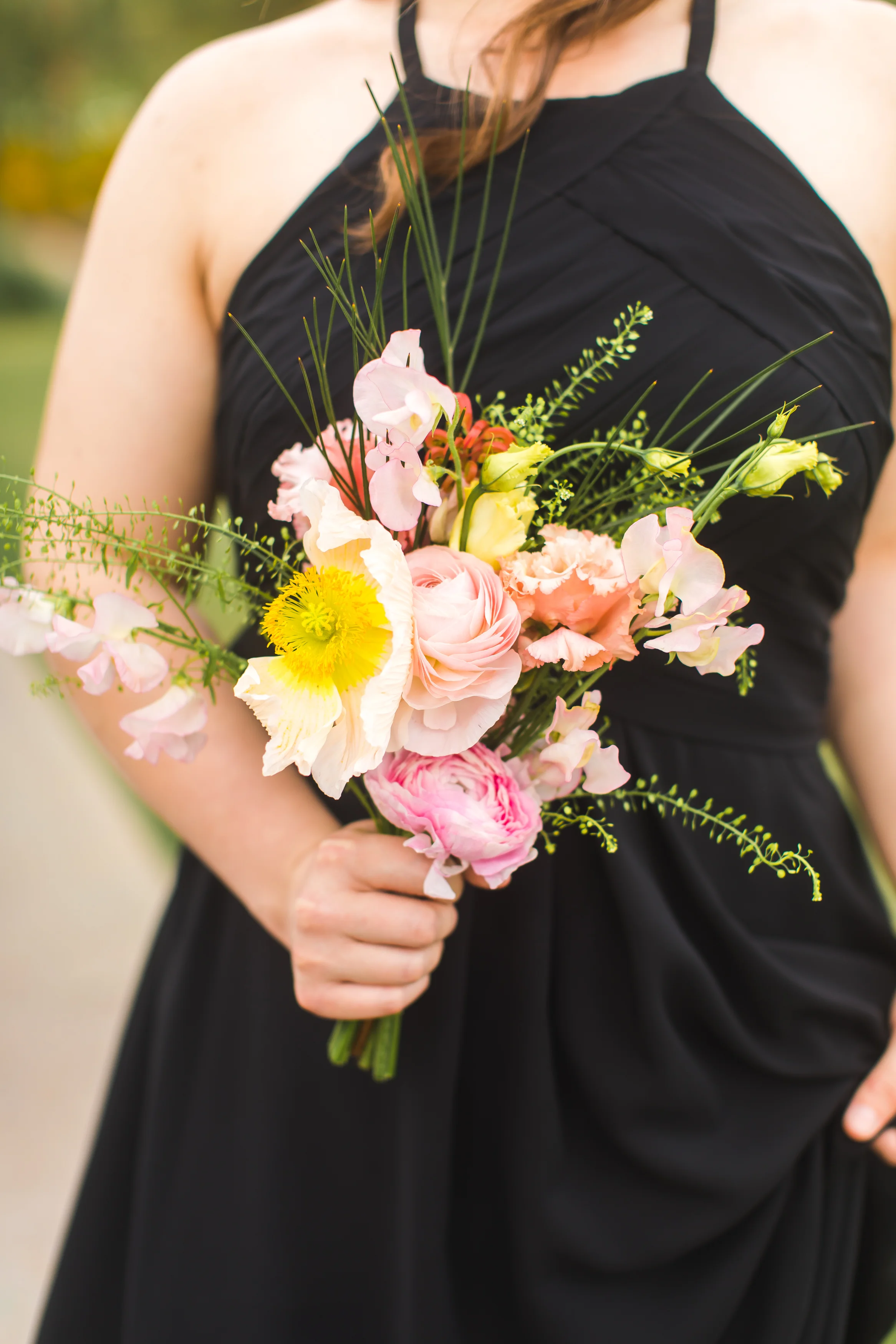 pink-poppy-rose-bridesmaids-bouquet-black-dress.jpg