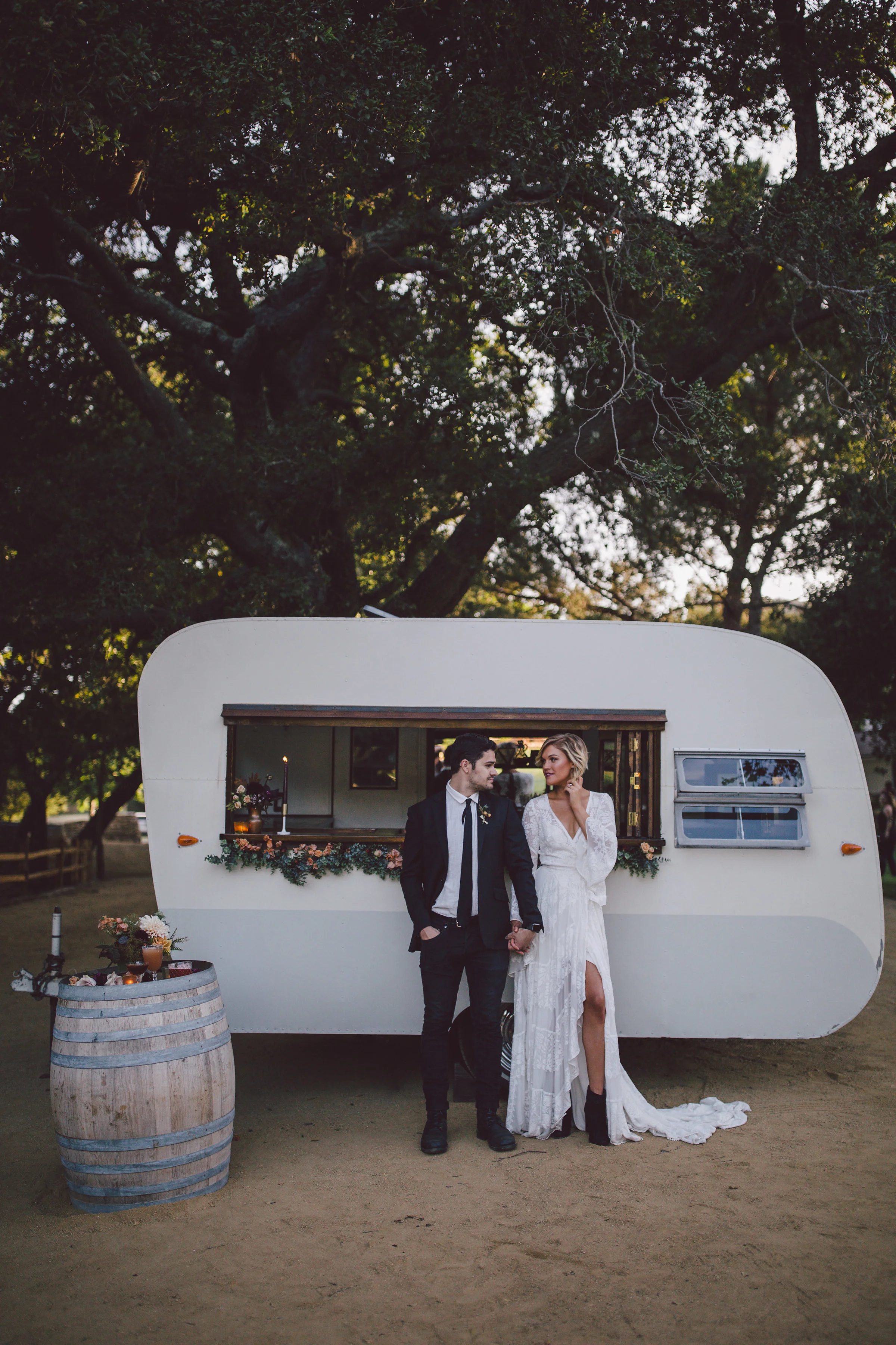 boho bride handsome groom old fashioned caravan bar