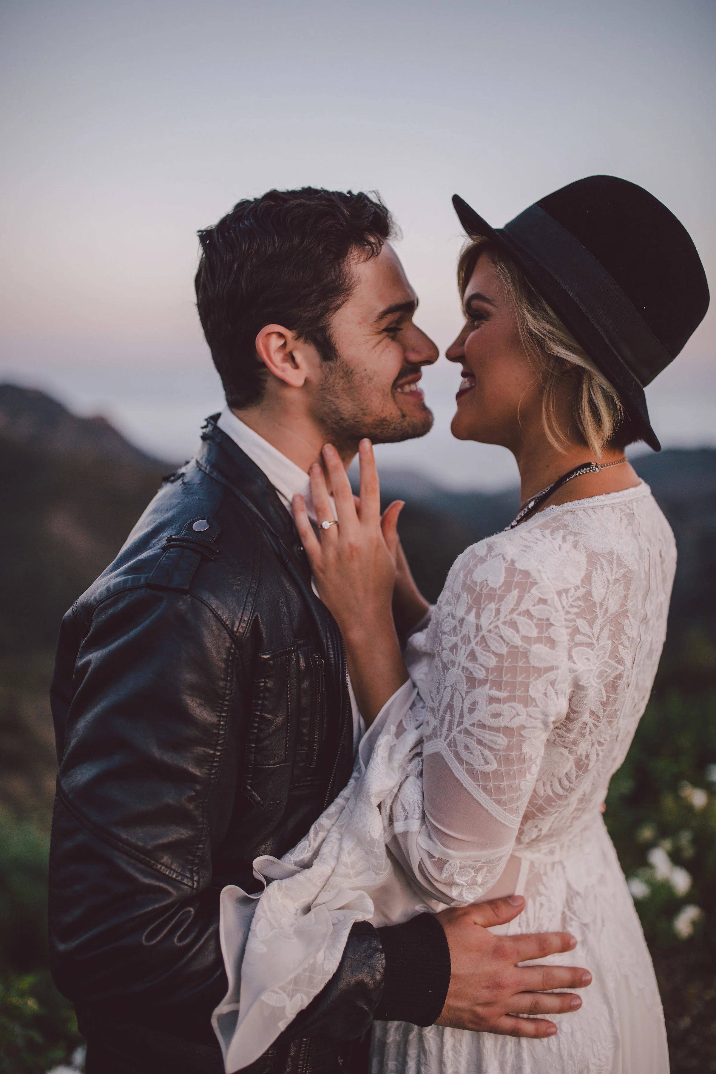 boho bride and groom kiss